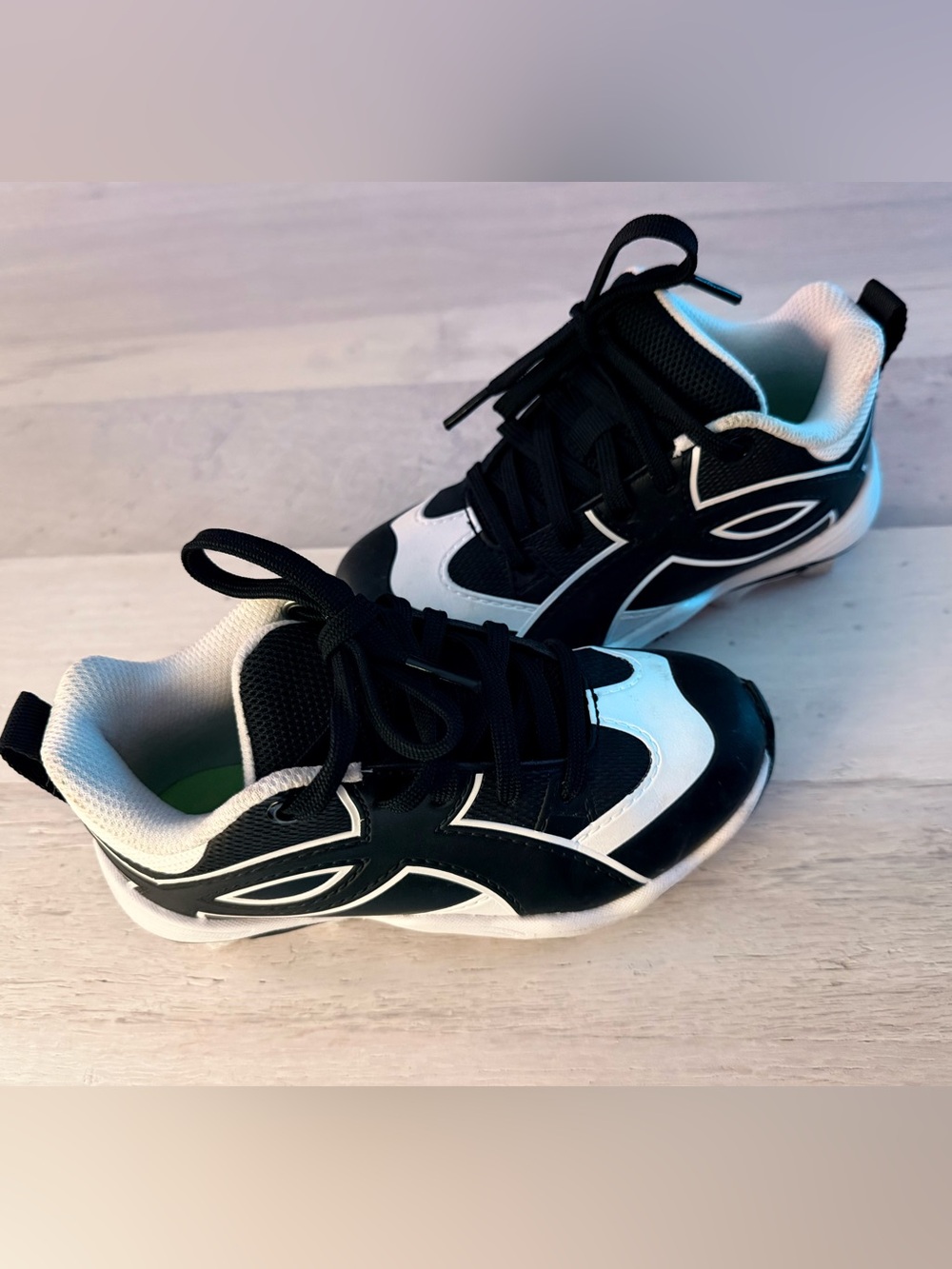 Under Armour Black and White Kids Cleats Baseball Athletic Sneakers